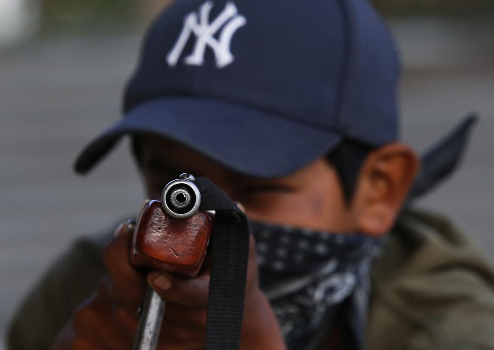 Niños con armas: postales de un México olvidado Foto: AP