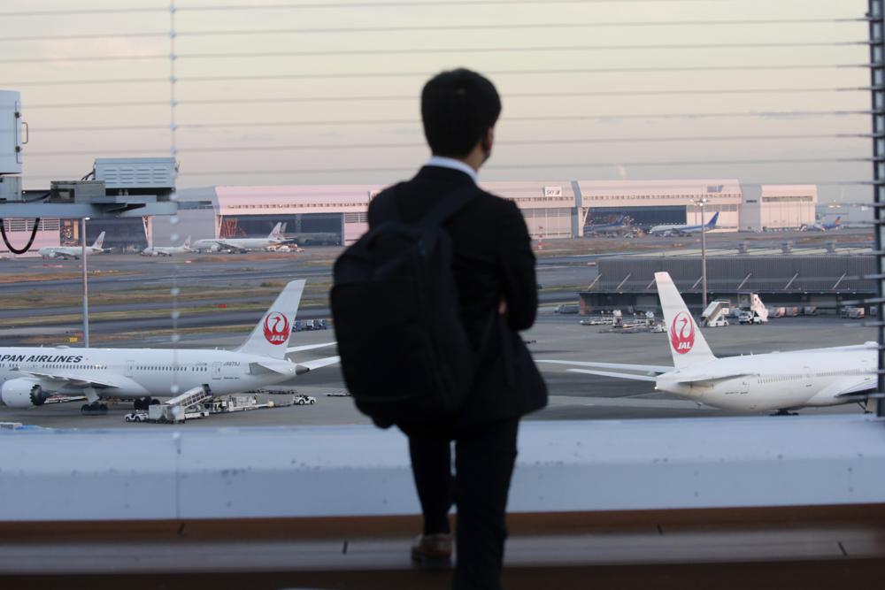 Japón para reservas de vuelos, variante ómicron se expande